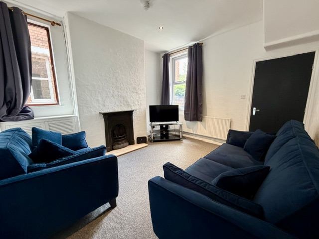 The comfortable furnished lounge with sofas at 57 Southport Road